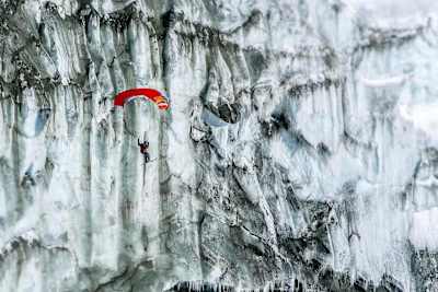 Skiing and paragliding is the most fun you can have on a mountain.