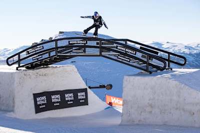 Myabi Onitsuka performs a lipslide on the rainbow rail in the female Snowboard slope style during the Winter Games at Cardrona Alpine Resort, New Zealand on September 3, 2017