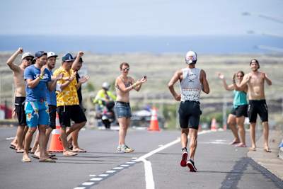 Igor Amorelli is cheered by spectators as he starts the marathon.