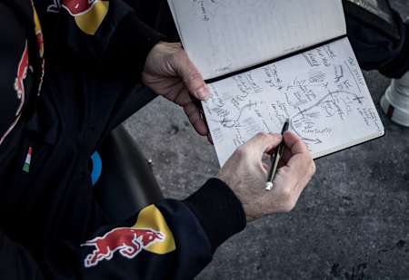 Dario Costa studies a diagram of his proposed flight down the Streif downhill ski course in Kitzbühel, Austria on January 18, 2025.