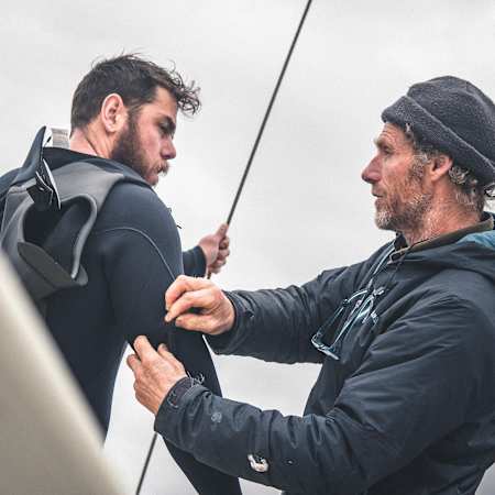 Ross getting help with his wetsuit during the Great British Swim.