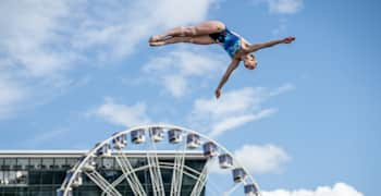 Molly Carlson of Canada dives from the 21m platform during the final competition day at Red Bull Cliff Diving World Series at the Oslo Opera House, Oslo, Norway, on August 10, 2024