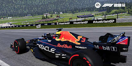 Screenshot aus F1 23 zeigt den Red Bull RB19 am Red Bull Ring mit dem Bullen im Hintergrund.