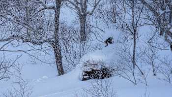 A snowboarder in action at Natural Selection Tour 2026