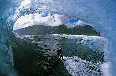 Mick Fanning by Jon Frank, during a bottom turn at Teahupo'o, Tahiti