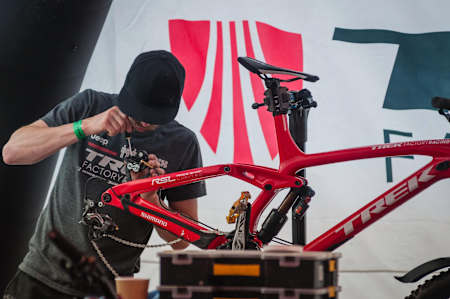 Trek Factory Racing team mechanic Will Soffe works on a Trek bike