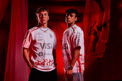 Liam Lawson and Arvid Lindblad pose in the VCARB Japan Team Kit ahead of the 2026 Japanese Grand Prix.