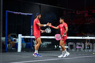 Alejandro Galán and Federico Chingotto team up on court at the Betclic Bordeaux Premier Padel P2 in Bordeaux, France in July 2025.