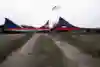 Dawid Godziek jumps the train cars on Red Bull Bike Express.