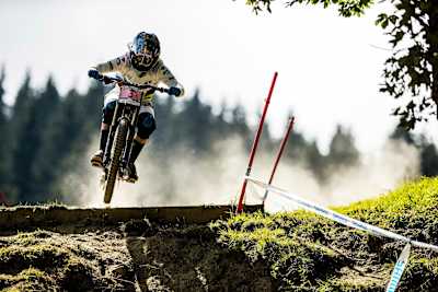 Rachel Atherton gets air over a drop