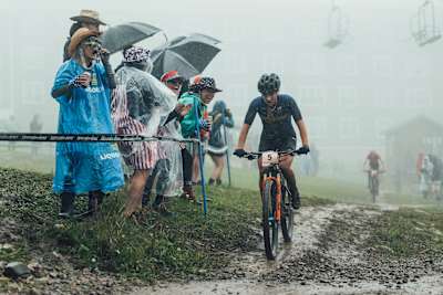 Jenny Rissveds rides next to fans at Snowshoe 2022.
