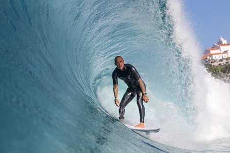 Local surfer Raoni Monteiro rides the tube at home in Saquarema, Brazil