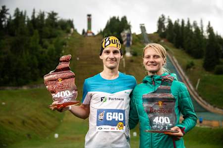 Martina Bellušová and Tomáš Maceček pose with their winner's trophies