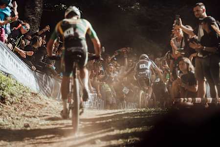 Riders kick up dust during the 2021 Mountain Bike World Championship in Val di Sole, Italy.