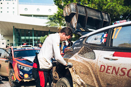 Sébastien Ogier pictured working on his car at the Acropolis Rally in Greece. 