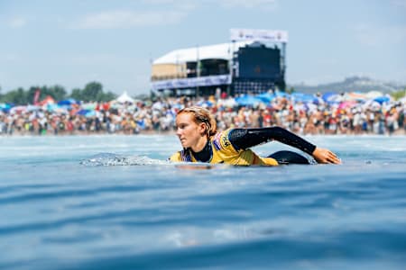 Caitlin Simmers paddling out at the WSL Finals at Lower Trestles