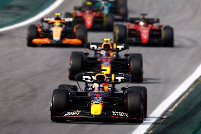 Max Verstappen leads a line of cars during the F1 Grand Prix of Brazil at Autodromo Jose Carlos Pace on November 13, 2022 in Sao Paulo, Brazil. 