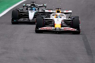 Isack Hadjar in a duel with George Russell at the 2025 Brazilian Grand Prix.