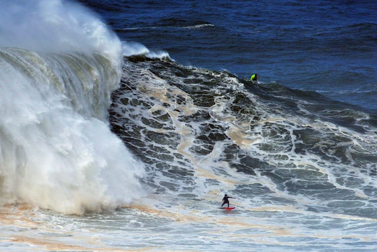 Justine Dupont Surfs Biggest Wave In Nazare Portugal