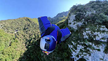 The Red Bull Skydive Team take flight over Altissimo, Italy.