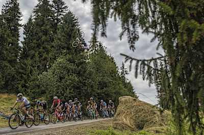 Szymon Godziek performs the world’s first flip over a road cycling peloton as it rushes through Bukowina Tarzańska on Aug. 4, 2017.