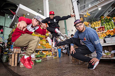 The judges (left to right), Red Bull BC One All Stars RoxRite, Pelézinho and Lilou, pose for a photo at a food market, prior to Red Bull BC One Latin America Final in Lima, Peru, on Ocotober 29, 2015.