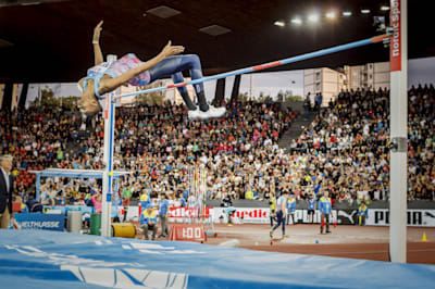 Photo of Mutaz Barshim high jumping.