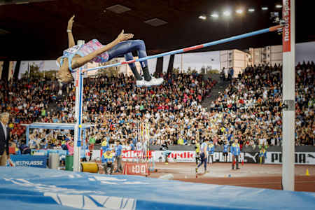 Photo of Mutaz Barshim high jumping.