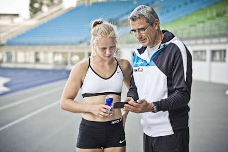 Photo of Sarah Lagger and her coach