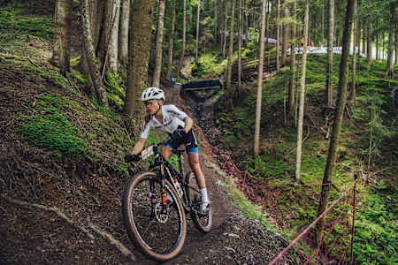 Loana Lecomte rides in the lead during the UCI XCO World Cup in Leogang, Austria on June 13, 2021.