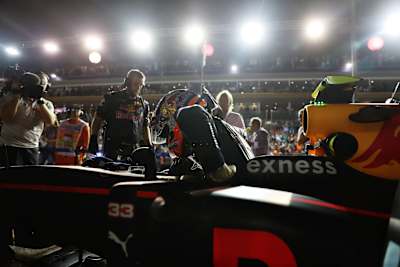 Red Bull Racing driver Max Verstappen takes his seat in his single-seater during the Formula 1 Singapore Grand Prix.