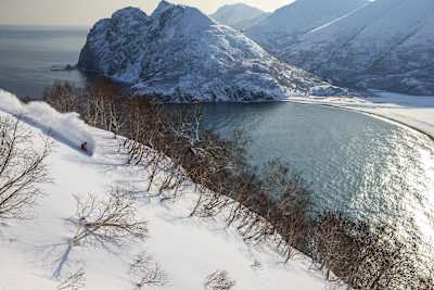 Travis Rice snowboards in Russia.