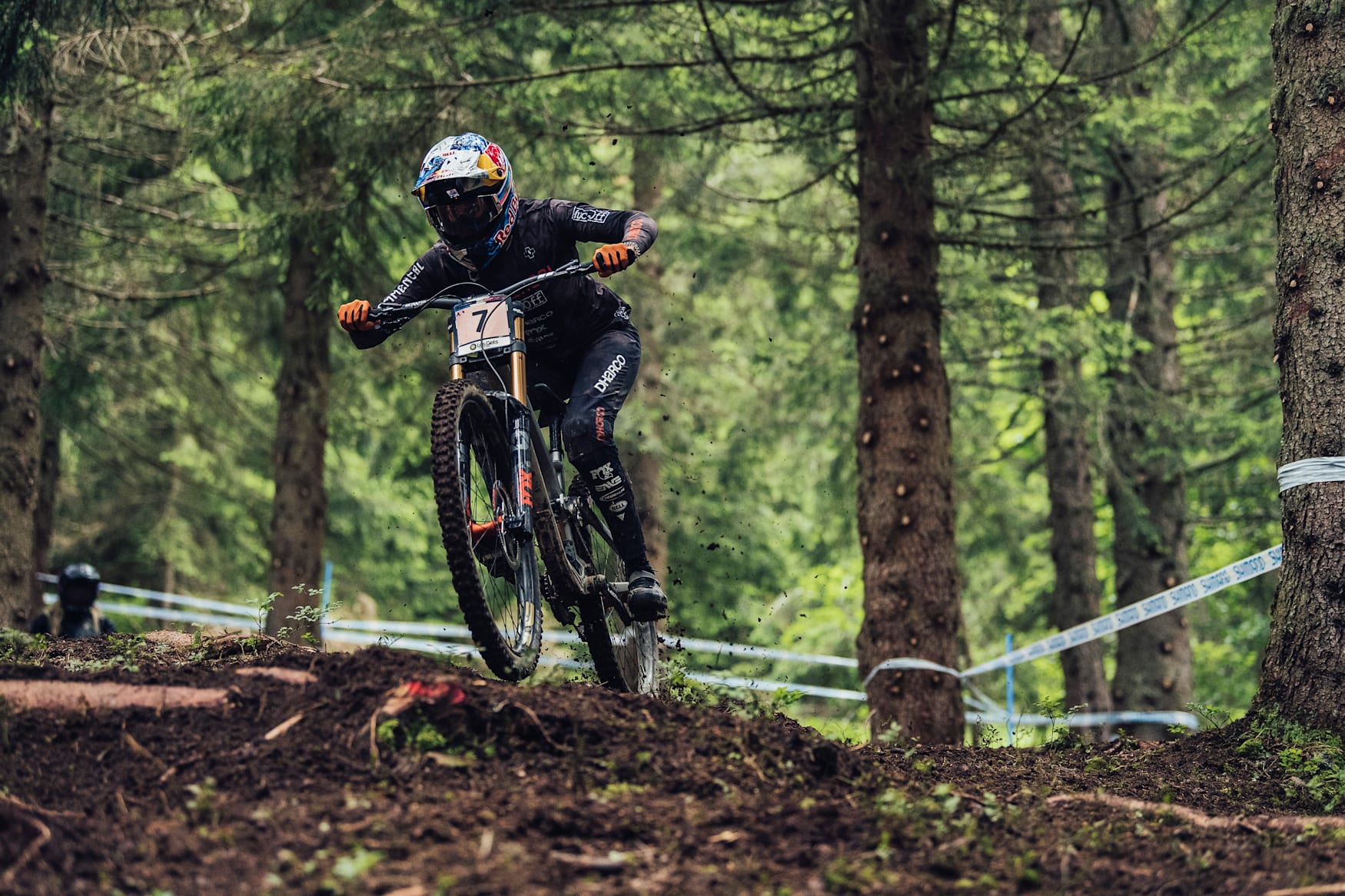 Myriam Nicole rides through the woods in Les Gets 2021.