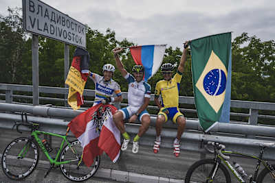 Pierre Bischoff, Alexey Shchebelin and Marcelo Florentino Soares at the end of the 14th stage Habarovsk - Vladivostok at the Red Bull Trans-Siberian Extreme race in Russia, on August 10, 2017