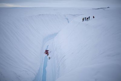 Filmcrew is roping Jochen Schmoll with the camera, Greenland.