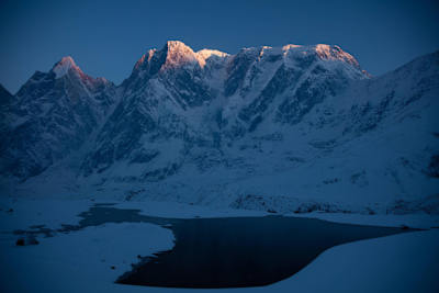Long-lens shot of the south east ridge of Annapurna III from Base Camp in Nepal on April 28, 2016.