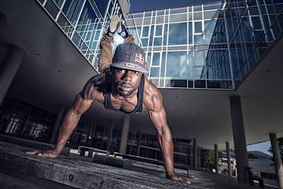 B-Boy Junior performs a Plank Freeze on the streets of Vienna, Austria.