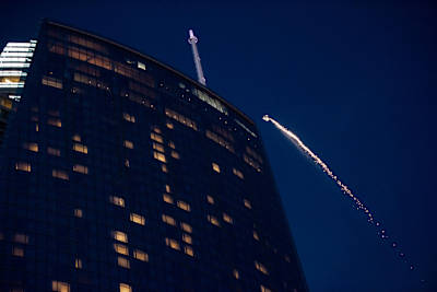 Mike Swanson soars through downtown Los Angeles in a wingsuit during the Supermoon on March 20, 2019.