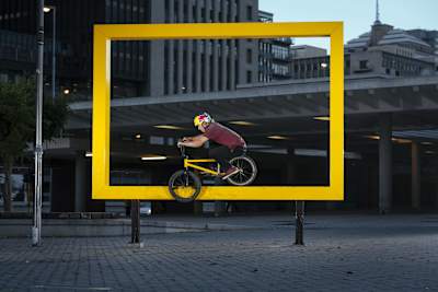 Murray Loubser jumps through a rectangle shape while riding in Cape Town, South Africa.