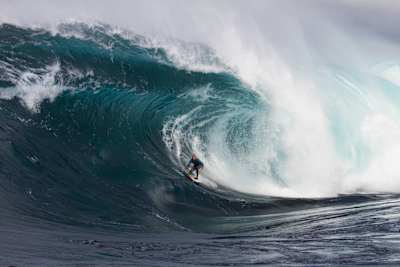 Big wave surfer Mark Mathews performs in Shipstern Bluff, Australia.