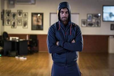 CS Santosh poses for a photo in a gym.