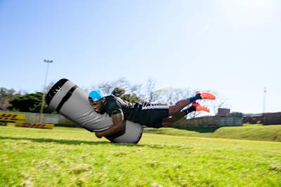 Siya Kolisi tackles a bag during Stormers' pre-season training in Cape Town, South Africa on September 7, 2020.