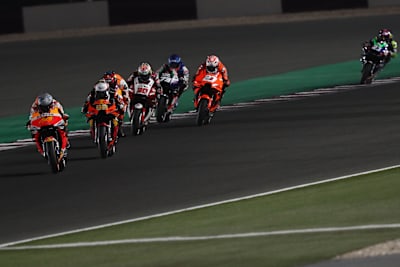 Pol Espargaro leads a group of riders during the MotoGP of Qatar on March 28, 2021.