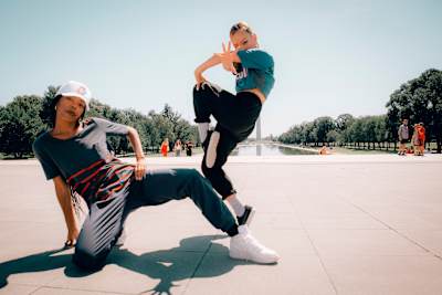 Angyil and Dassy pose for a portrait in Washington, D.C.