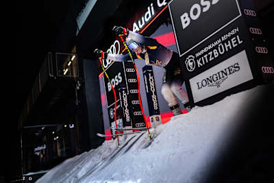 Skier Lindsey Vonn prepares to ski the Streif at night. 