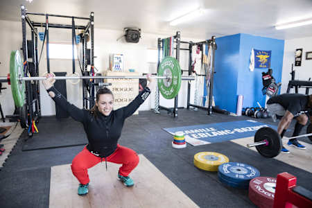 In case you don't believe that lifting weights makes you happy…