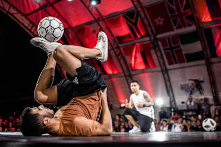 Ricardo 'Ricardinho' Fabiano Chahini de Araújo of Brazil competes against Sebastian 'Boyka' Ortiz of Colombia during the Red Bull Street Style World Final in Miami, USA on November 15, 2019.