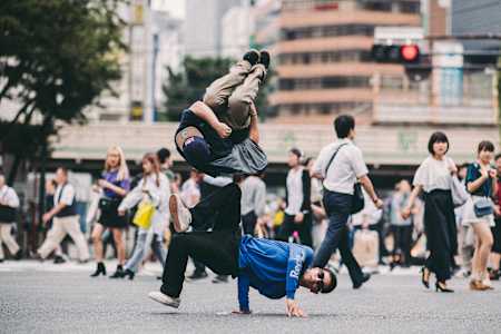 Issei and Victor pose for an action shot on Shibuya Crossroad during the Red Bull Dance Tour in Tokyo, Japan on July 6, 2019.