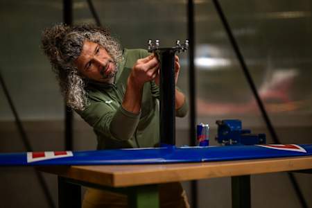Andreas Podlipnik seen working on a prototype of the world's first wingsuit foil.    