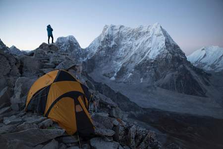 David Lama scouting Lunag Ri from Fox Peak during acclimatization on October 14, 2018.